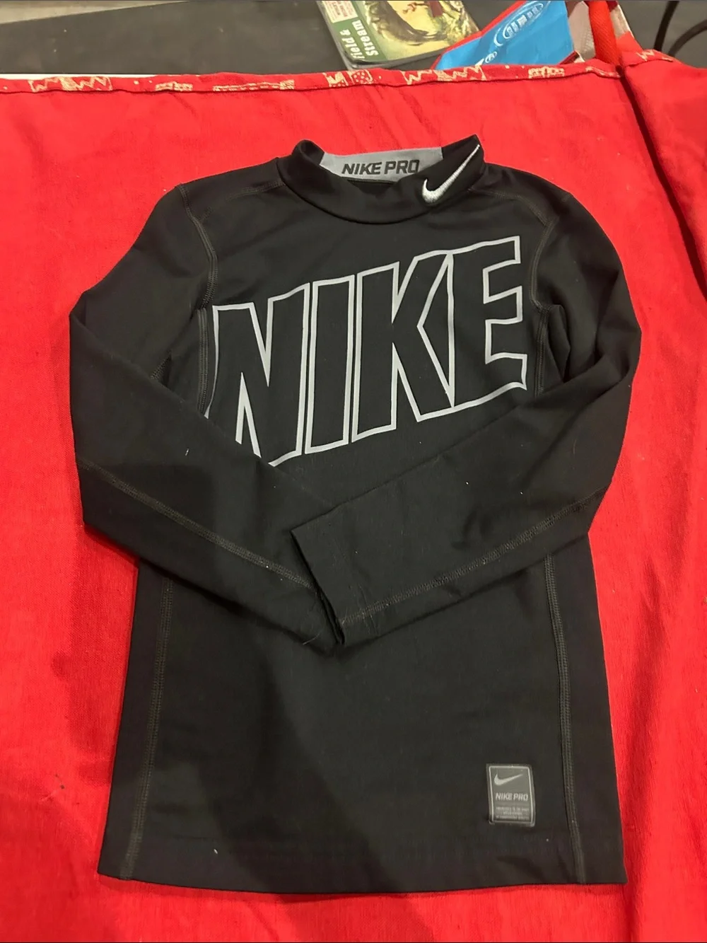 Nike Black Long-Sleeve Youth Compression Top with Large Logo